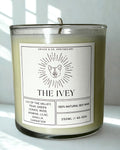 Candle labeled 'The Ivey' with a label design featuring a fox, on a white surface with a light background.
