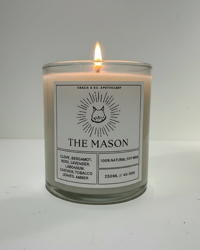 Candle jar labeled 'The Mason' on a white background